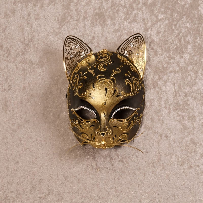 Máscara veneciana de gato de papel maché, hecha a mano según la tradición veneciana. Decorado con perlas, metales calados. marcela