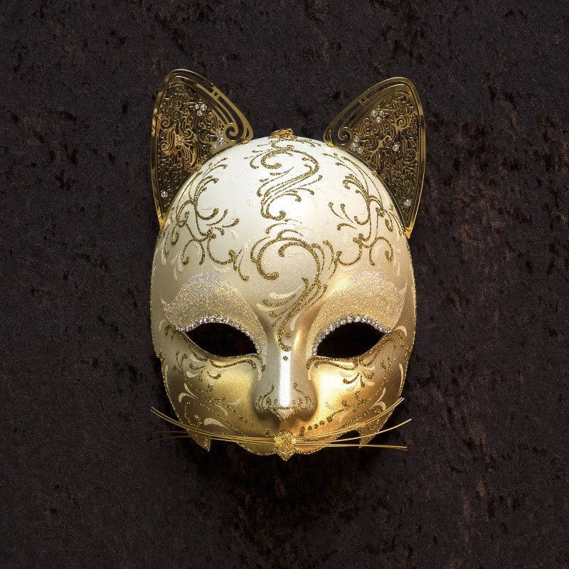 Maschera gatto veneziana in cartapesta, realizzata a mano secondo la tradizione veneziana. Decorato con, perle, metalli traforati . Marcela