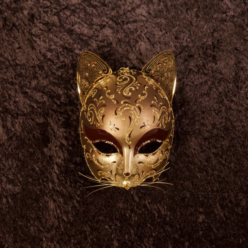 Máscara veneciana de gato de papel maché, hecha a mano según la tradición veneciana. Decorado con perlas, metales calados. marcela