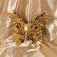 Máscara de mariposa en papel maché, realizada de forma artesanal. Decorado con finas pasamanería, perlas y filigrana metálica. Marcela.