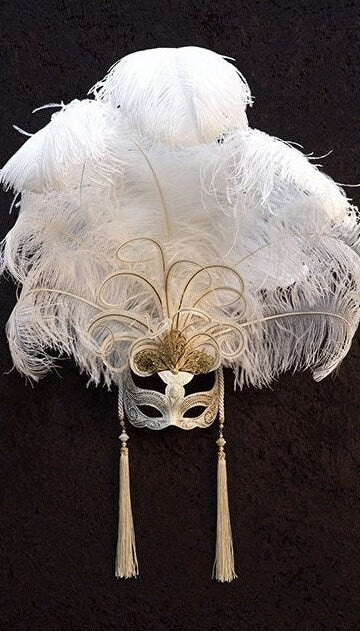 Mask with feather ornament, handmade in Italy. Elegant Venetian craftsmanship. Marcella.