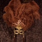 Máscara con adorno de plumas, hecha a mano en Italia. Elegante artesanía veneciana. Marcela.