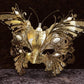 Butterfly  mask in papier-mâché, made in artisan form. Decorated with fine trimmings, pearls and metal filigree . Marcella.